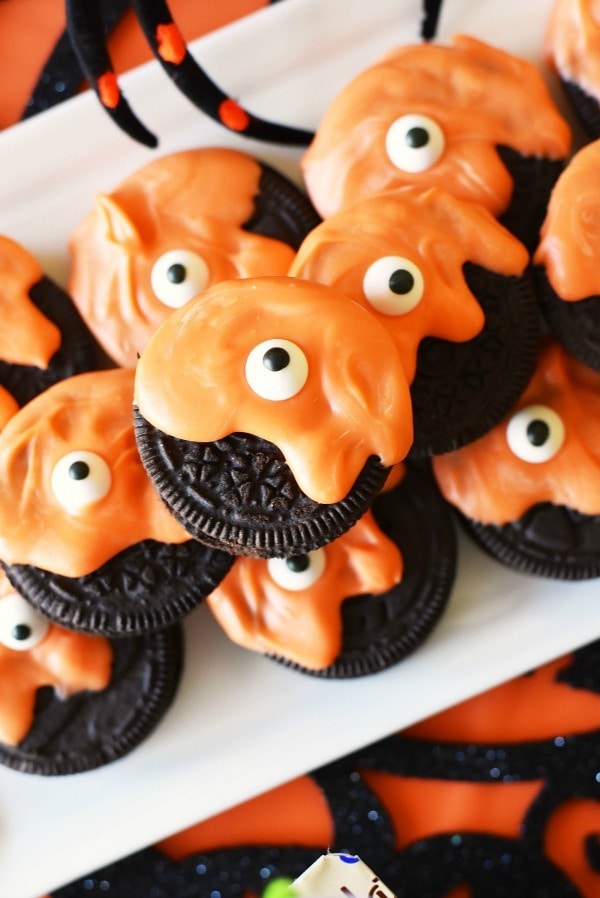 orange dipped oreos with candy eyes