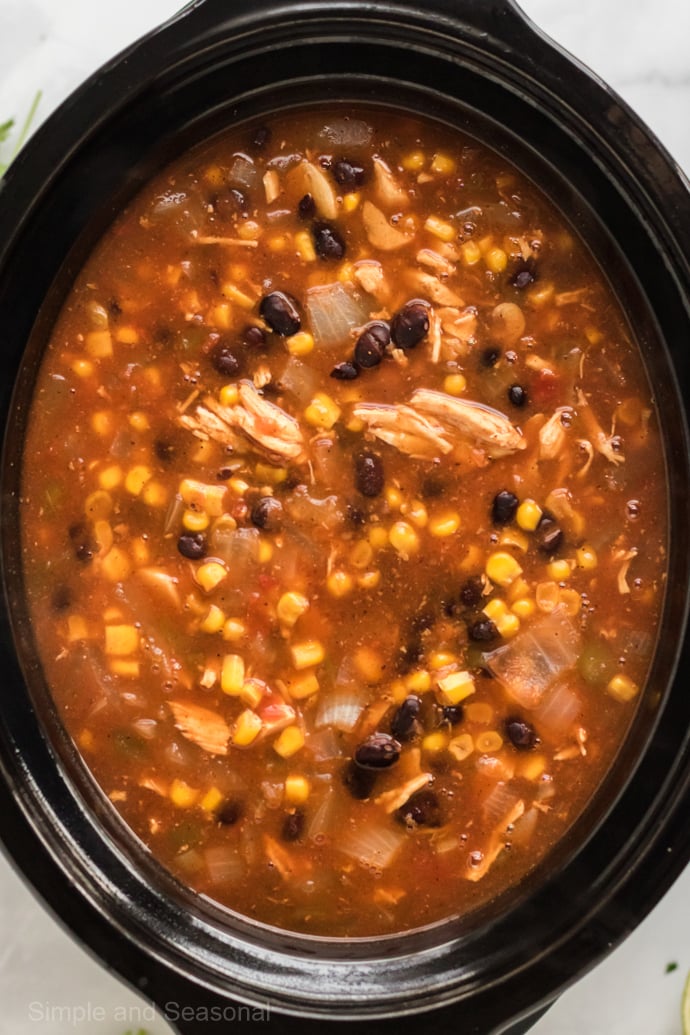 cooked chicken tortillas soup in the slow cooker crock