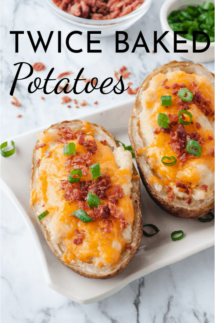 Twice Baked Potatoes are a perfect appetizer or snack for game day parties! They are creamy, cheesy and covered in bacon-the perfect bite. via @nmburk