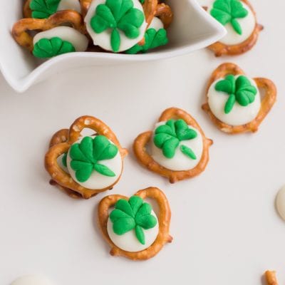 close up of pretzels with with green shamrocks