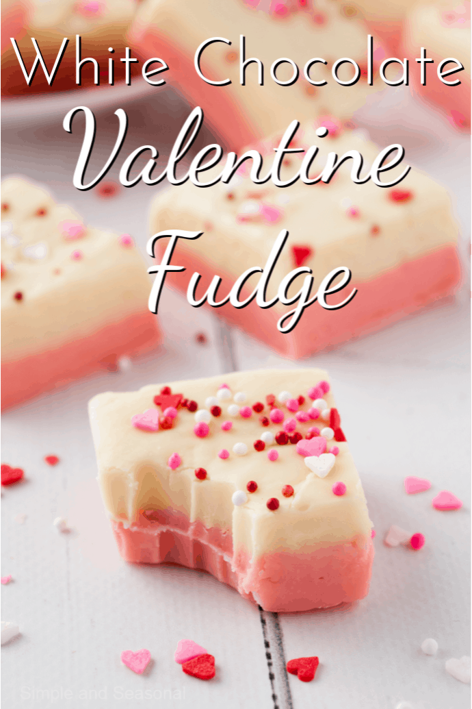square of fudge with bite taken from it and label that reads: white chocolate valentine fudge