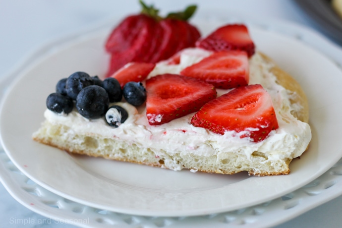 slice of Rhodes Roll Fruit Pizza on a white plate