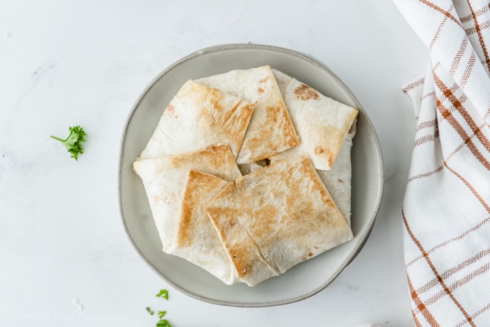 closeup of browned tortilla around the crunchwrap