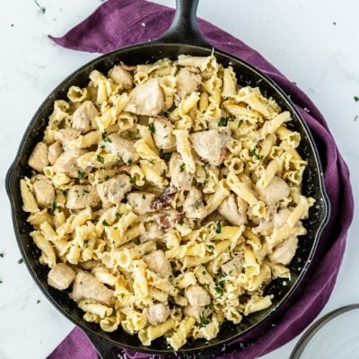 cooked pasta in skillet with meat and sauce