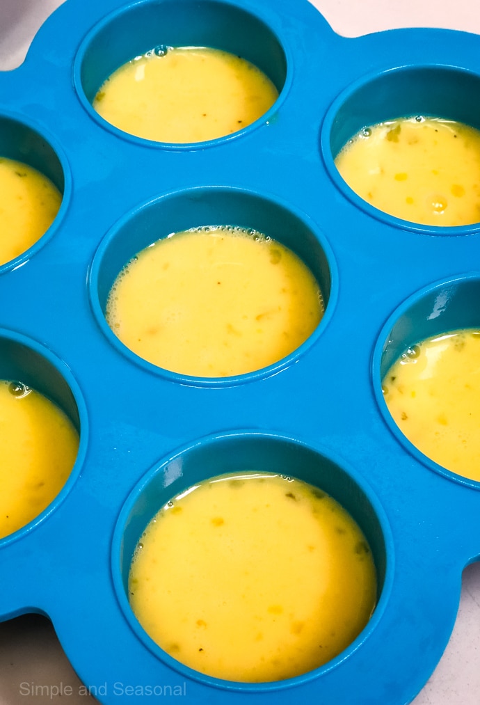 raw egg mixture in egg bites mold