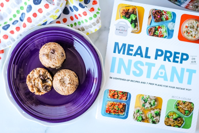 top down view of banana oatmeal bites and the cover of the cookbook Meal Prep in an Instat