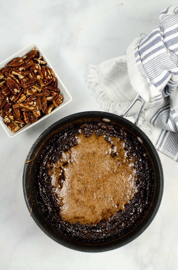 cooked pie mixture in a pot with bubbly syrup on top