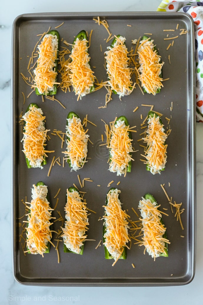 full tray of crack chicken jalapeno poppers ready to bake