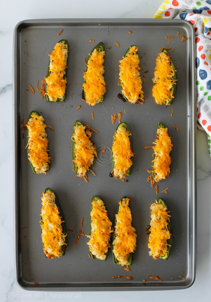 tray of cooked jalapeno poppers