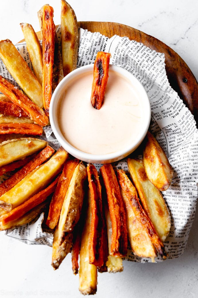 baked carrot fries on a serving platter