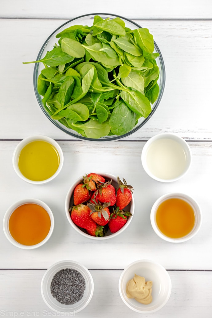 ingredients for honey dijon dressing and spinach salad