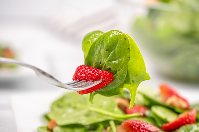 forkful of spinach and strawberry