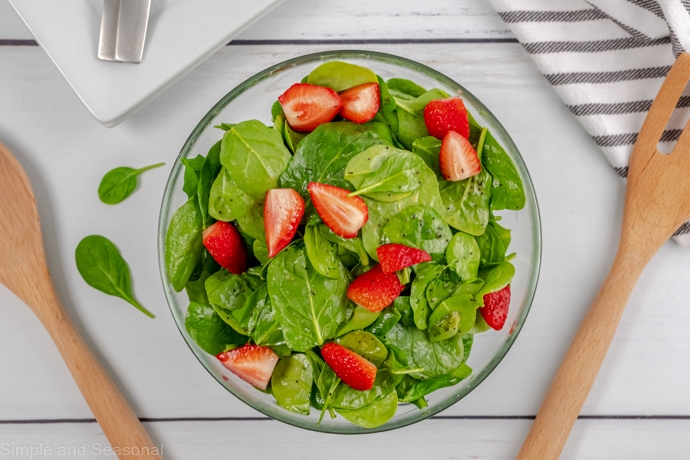 spinach strawberry salad in a bowl