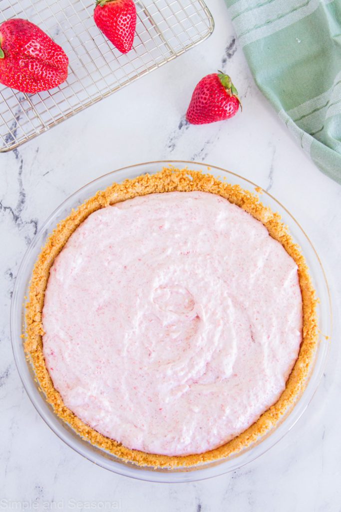 strawberry mousse in a graham cracker crust