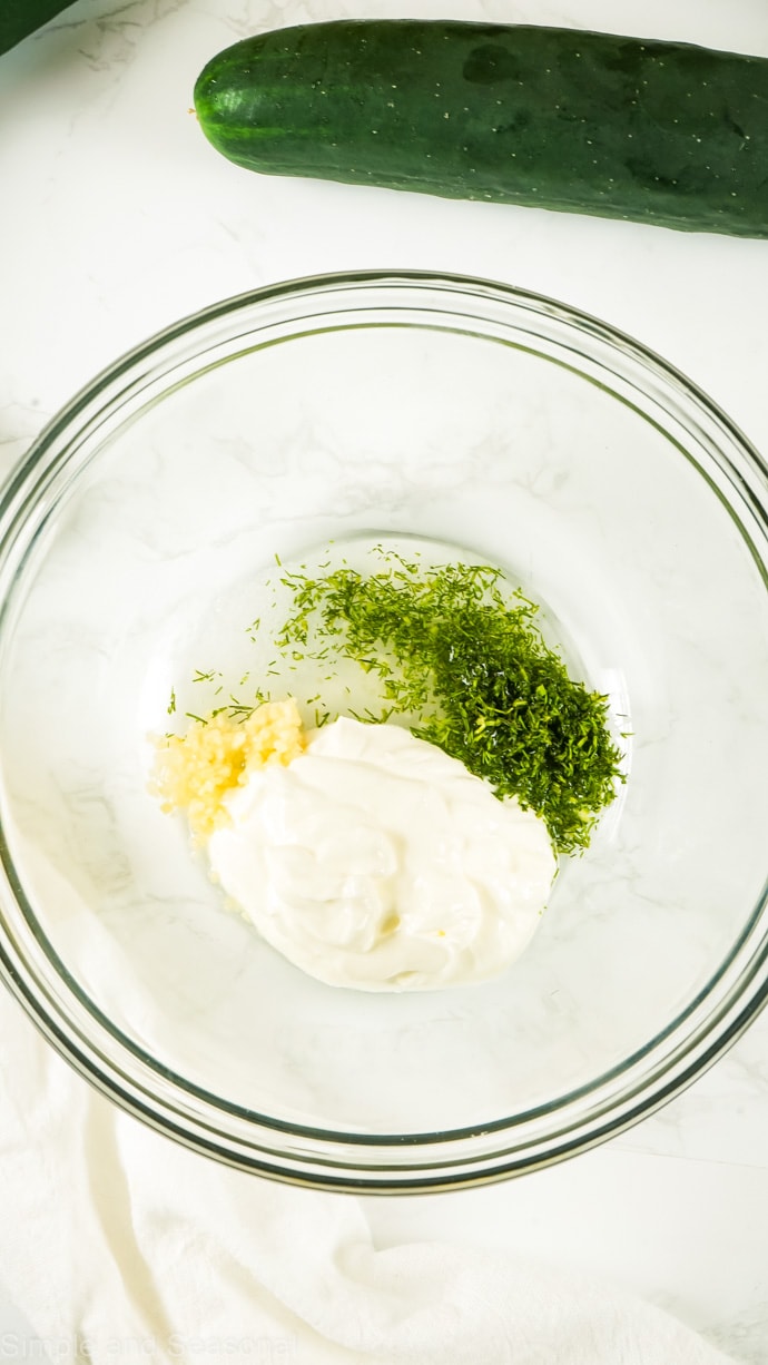 sour cream, dill and garlic in a bowl