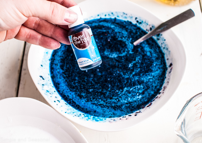 blue food coloring and blue slush in a bowl