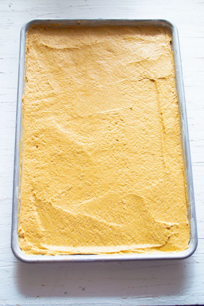top down view of batter in a sheet cake pan