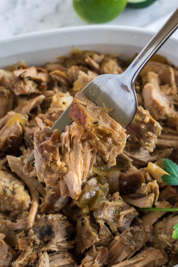 forkful of shredded slow cooker Cuban pork