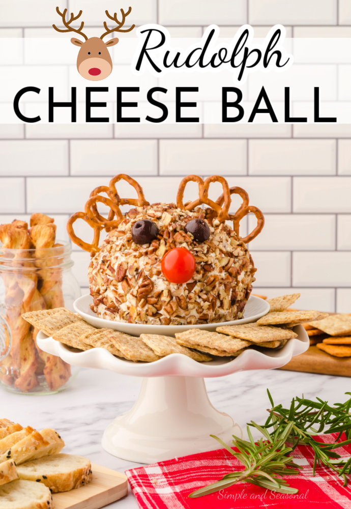 reindeer cheeseball on a stand platter with crackers
