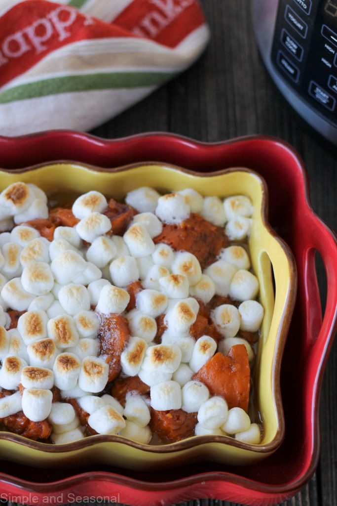 cooked candied yams topped with roasted marshmallows