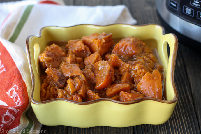 cooked yams in a yellow serving bowl