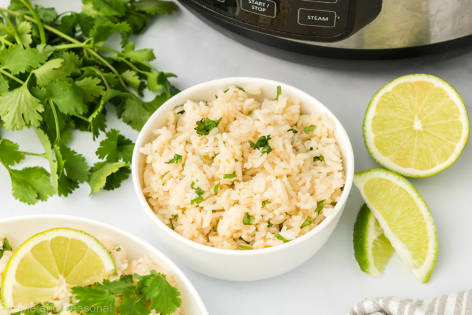 bowl of cooked rice on a white background