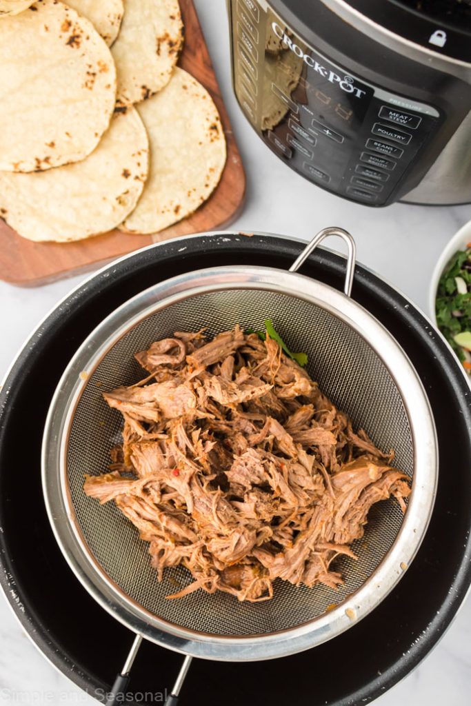 strainer holding beef