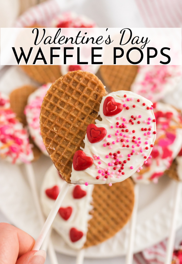 hand holding a heart shaped waffle pop; text label reads Valentine's Day Waffle Pops