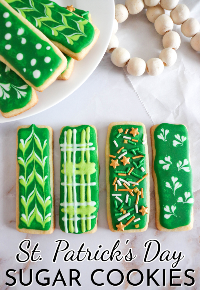 4 sugar cookies decorated with green icing and sprinkles; text label reads St. Patrick's Day Sugar Cookies