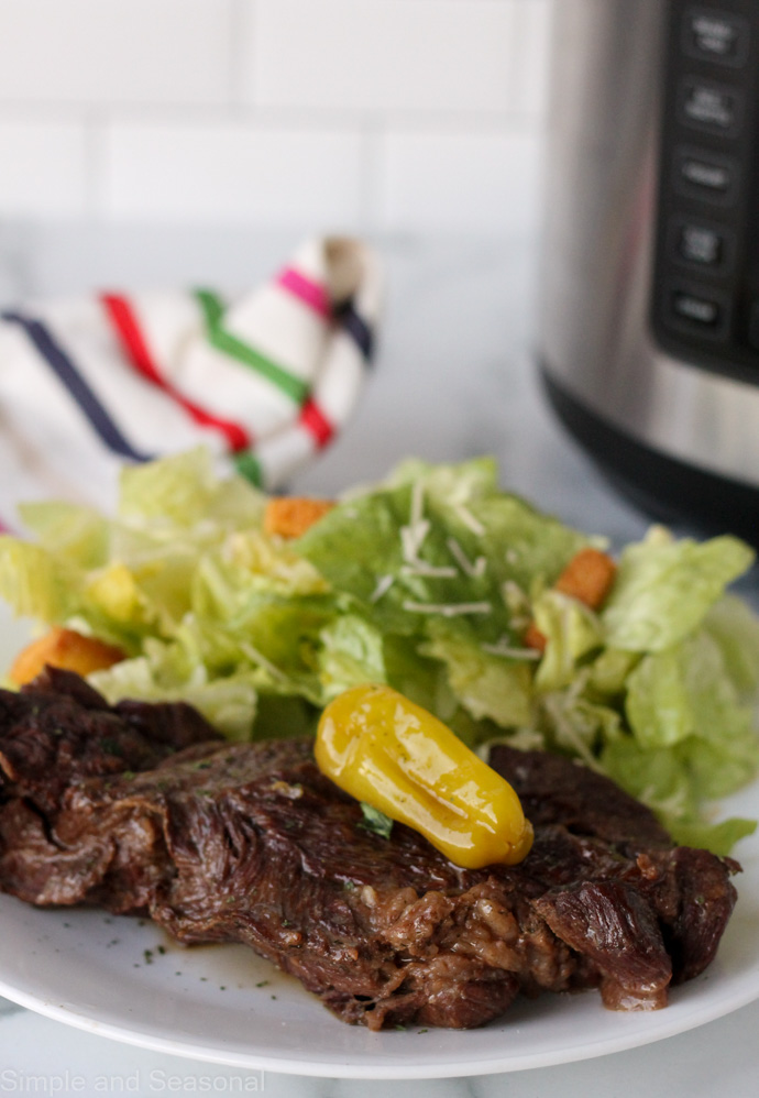 plate of cooked mississippi pot roast