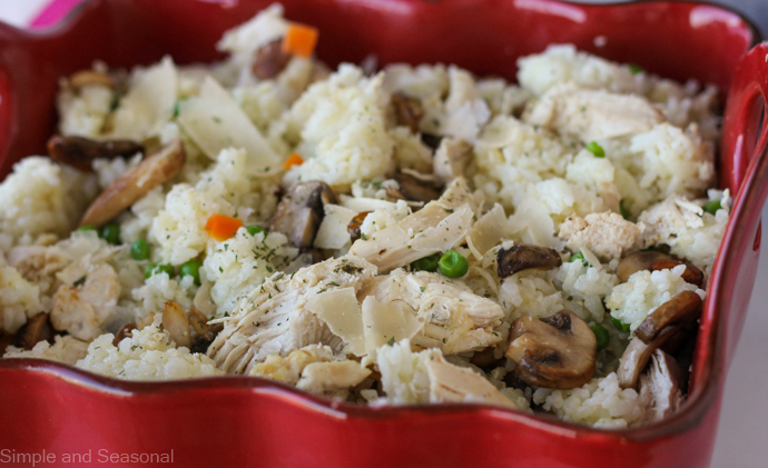 close up of chicken and rice with vegetables
