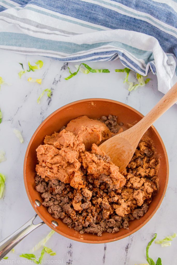 refried beans stirred into ground beef