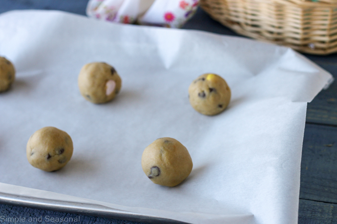 cookie sheet filled with 6 dough balls