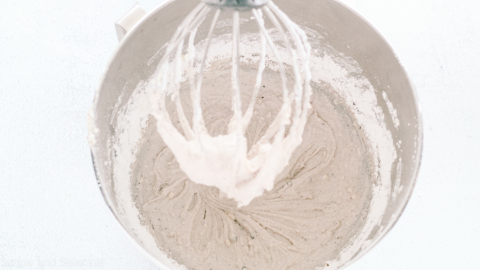 whisk over mixing bowl with cookies and cream dip