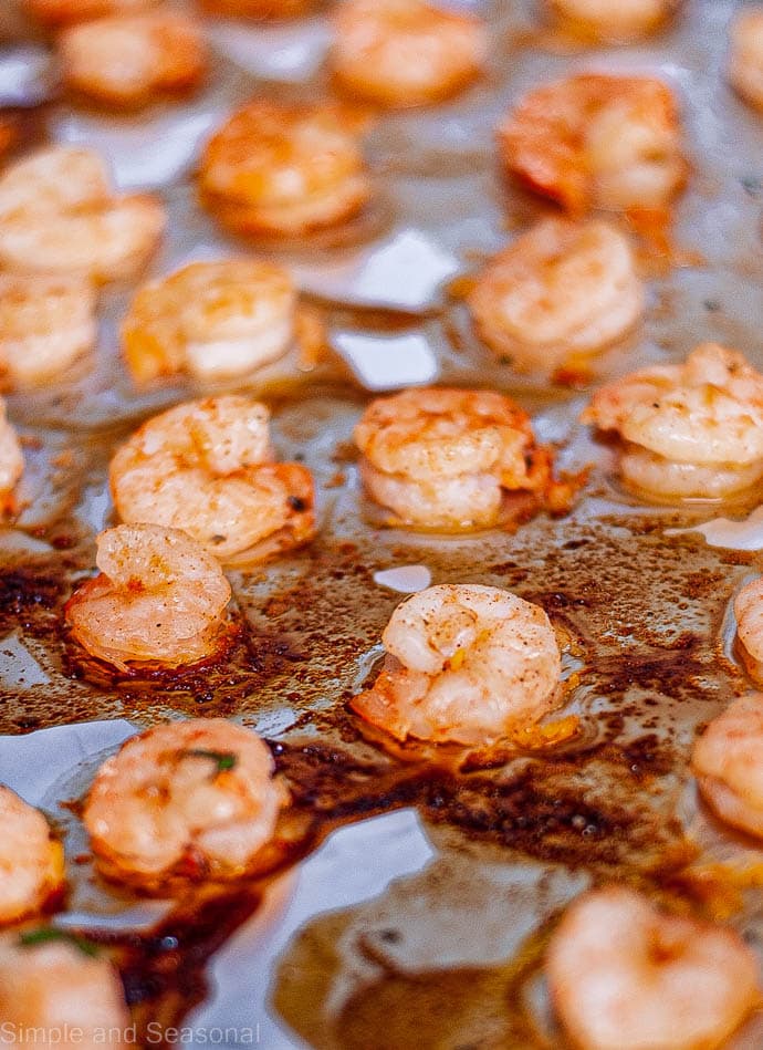 cooked shrimp on a baking sheet