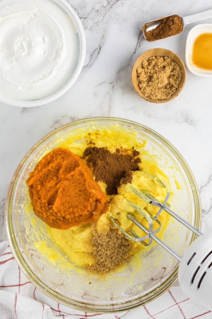 brown sugar, spices, pumpkin and pudding mixture in a bowl