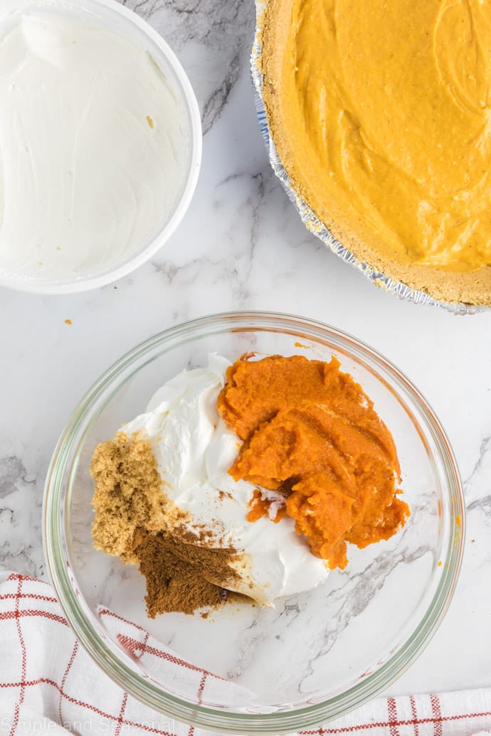 pumpkin, brown sugar, spices and whipped topping in a mixing bowl