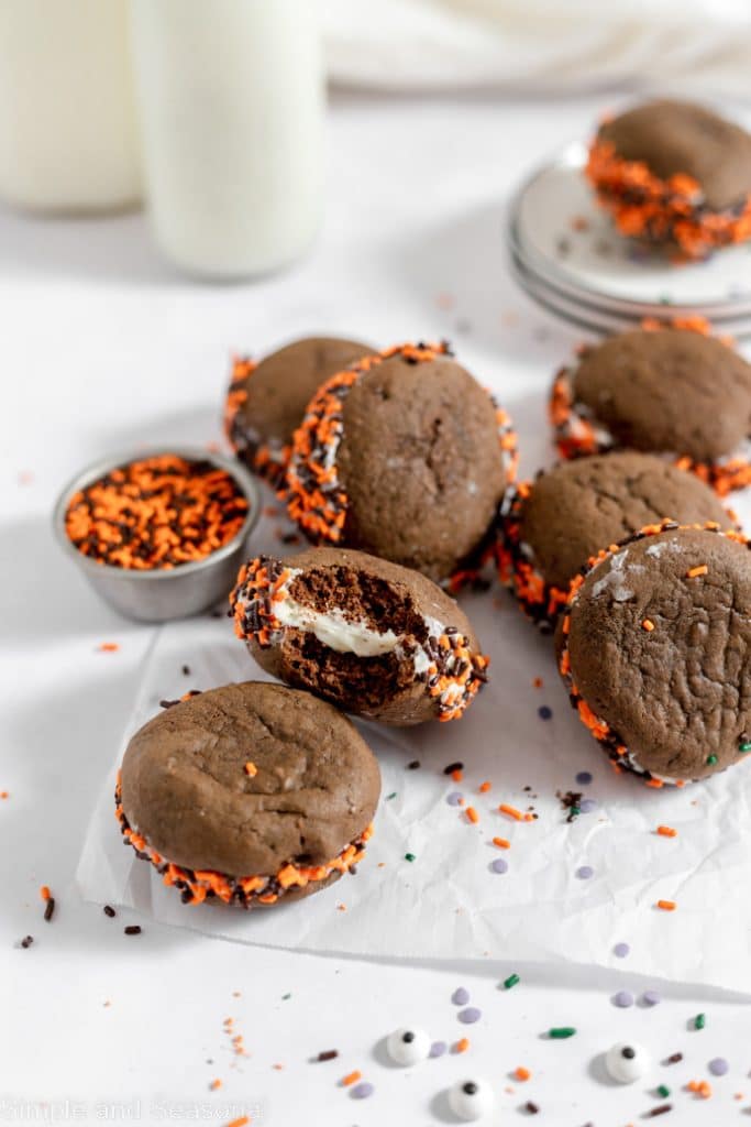 batch of chocolate whoopie pies with Halloween sprinkles and decorations