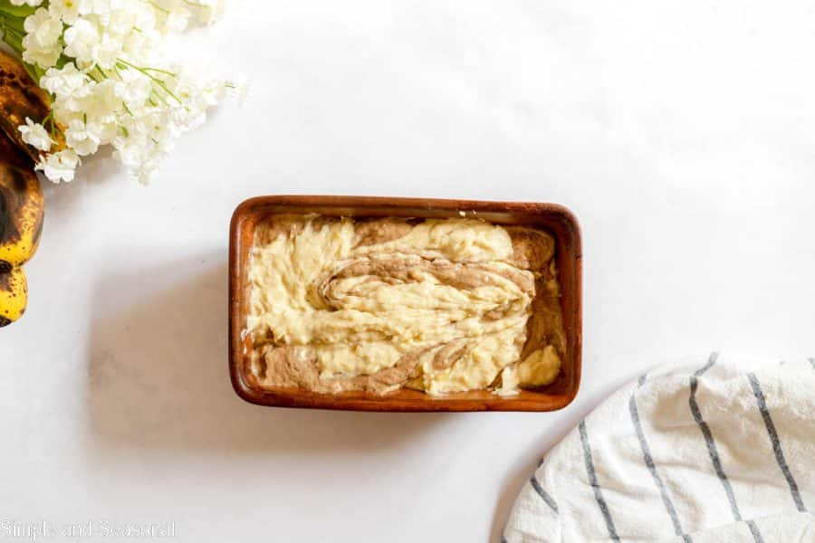 batter swirled together in a loaf pan