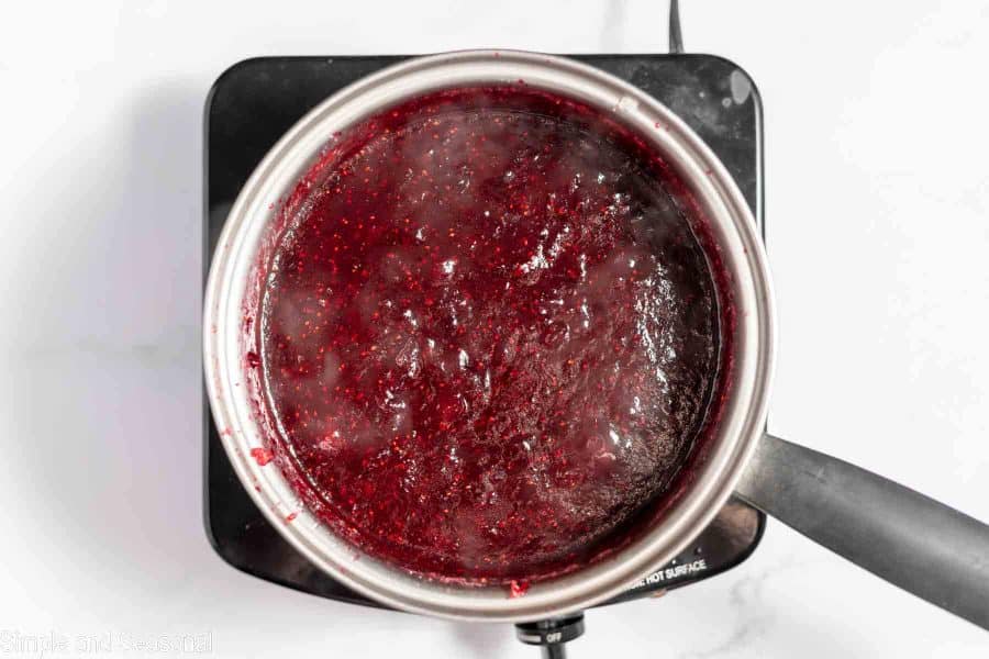 cooked cranberry jam in a saucepan