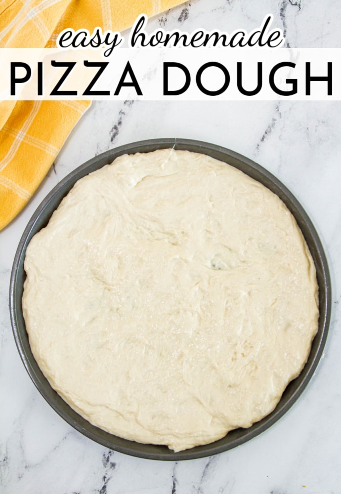 pizza dough in a pizza pan