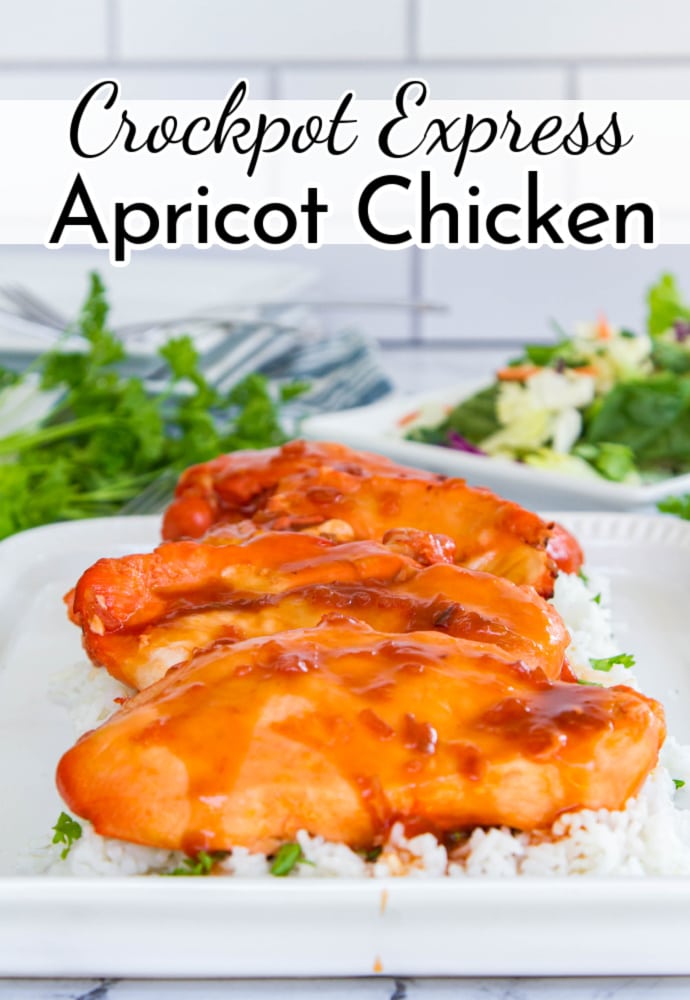 platter of cooked chicken with salad in the background; text overlay reads Crockpot Express Apricot Chicken