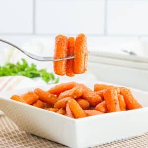 closeup of carrots on fork