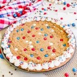 square cropped image of whole cookie pizza decorated for 4th of July celebrations