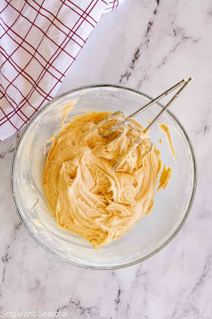 smooth and creamy biscoff cookie spread frosting in a mixing bowl