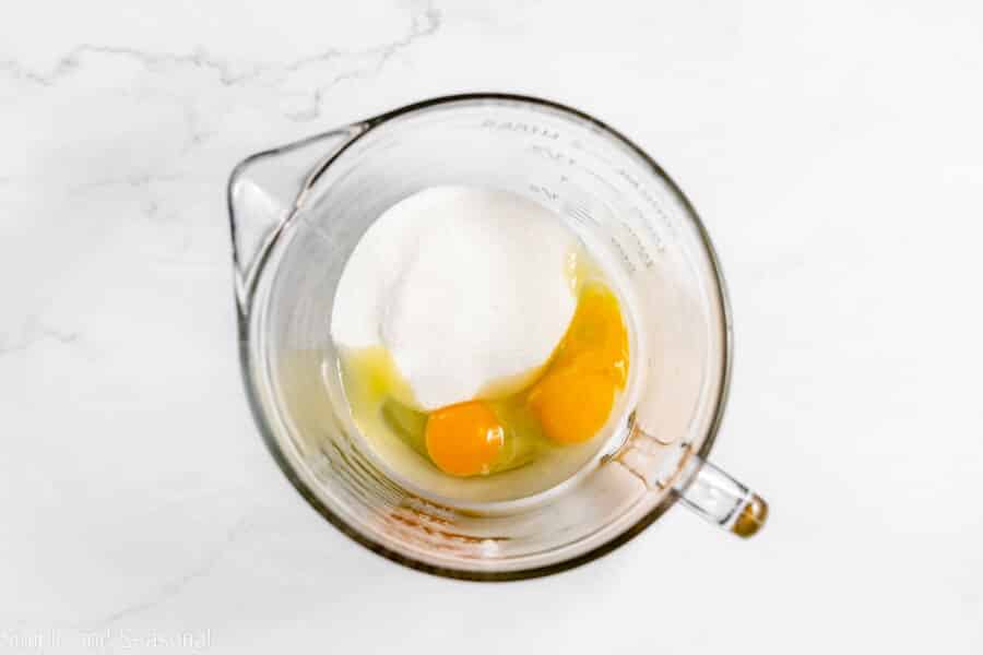 eggs and sugar in a mixing bowl