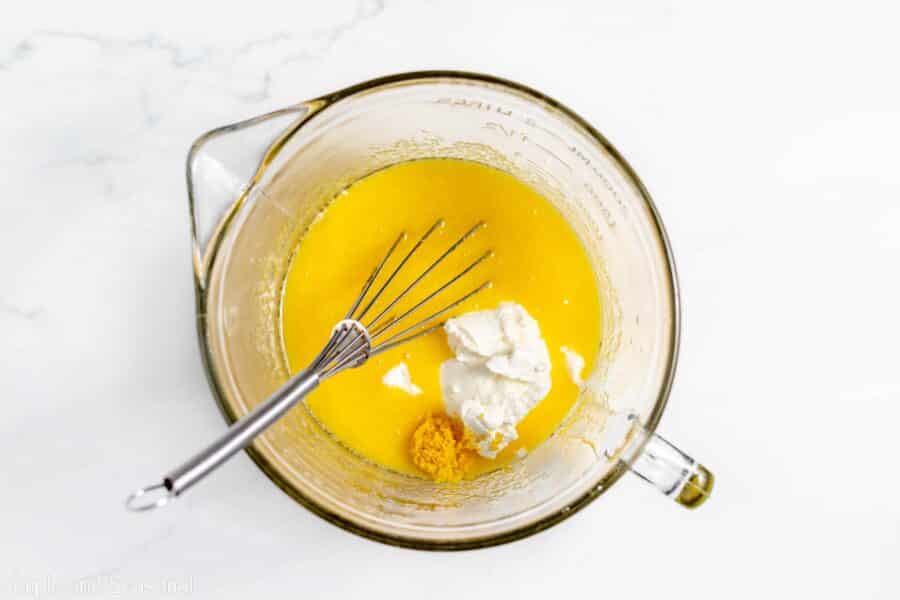 lemon zest and sour cream added to the egg mixture