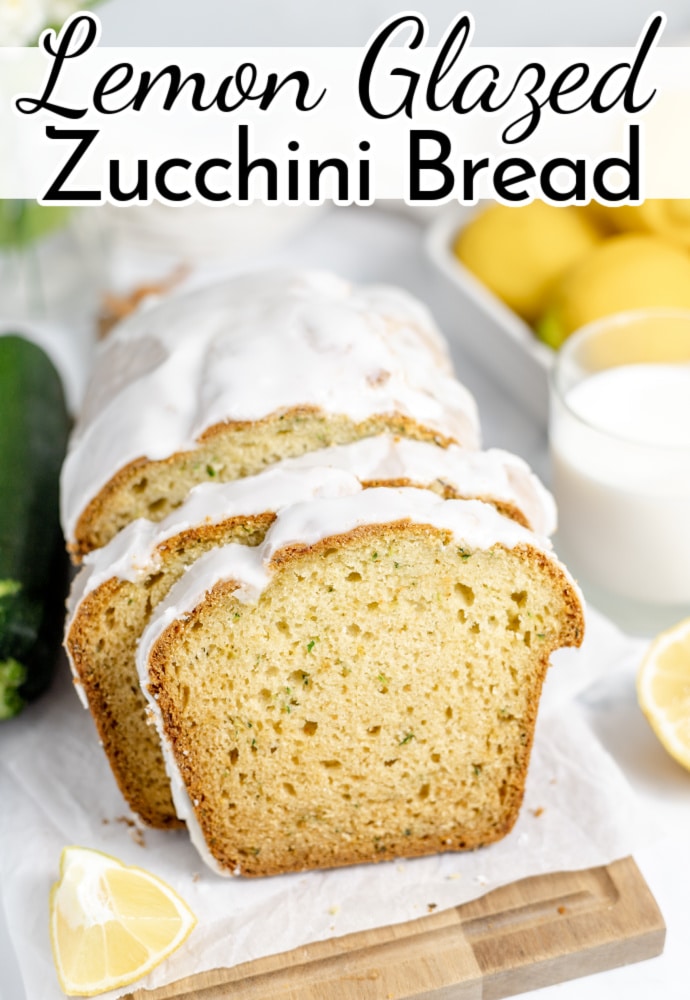 sliced of bread on a cutting board; text overlay reads: Lemon Glazed Zucchini Bread