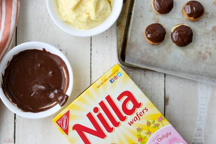 top down view of melted chocolate, pudding filling and box of Nilla wafers