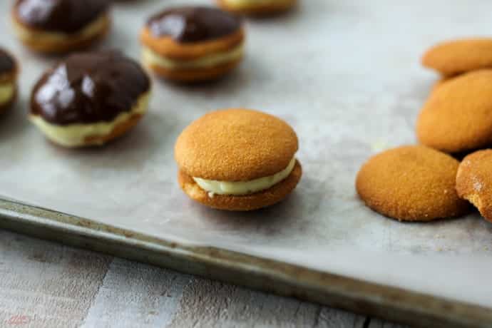 second wafer cookie placed on top of cream filling